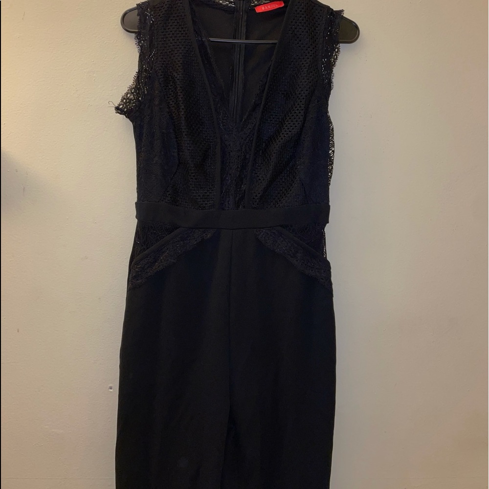 Black Lace jumó suit. Size medium.